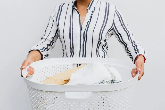 a person with a basket of laundry