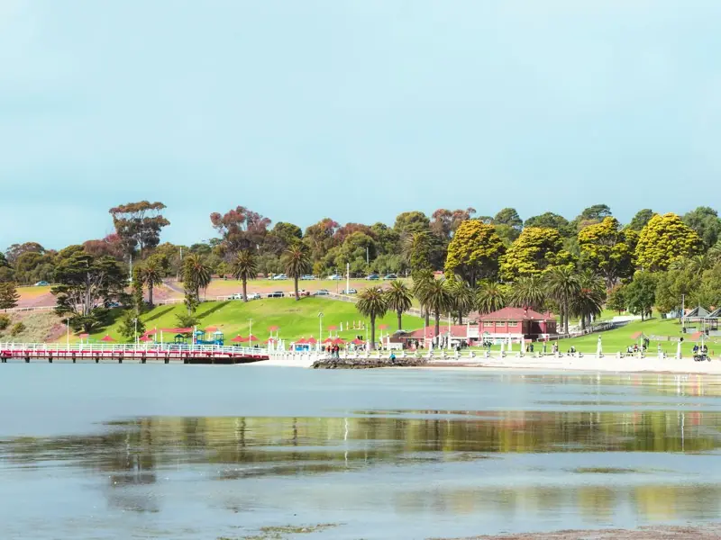 Eastern Beach in Geelong, with its promenade, pavilion and palms beside Corio Bay.