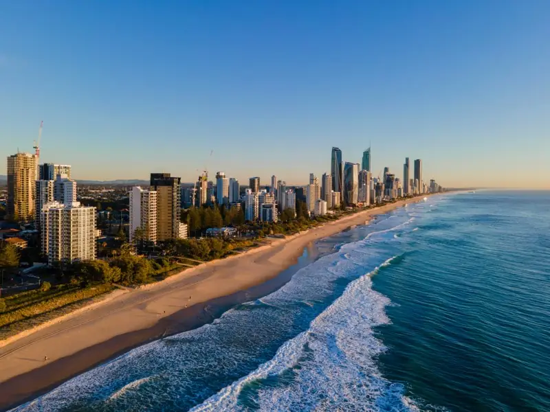 The Gold Coast’s beachfront towers stretching towards Surfers Paradise in early morning light.