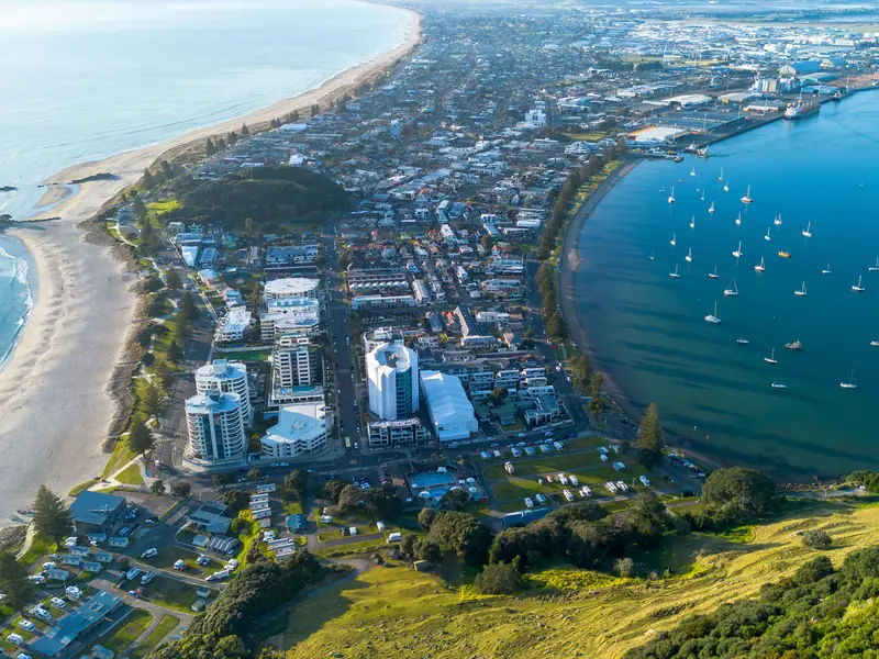 Mount Maunganui in Tauranga from the summit of Mauao, between the ocean beach and the harbour.