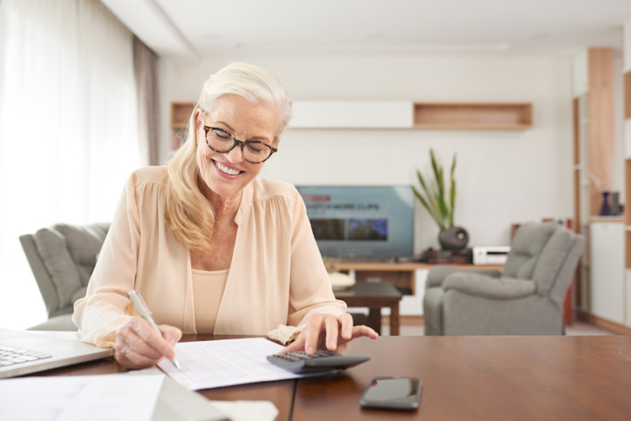 Woman Working on an Expense Report