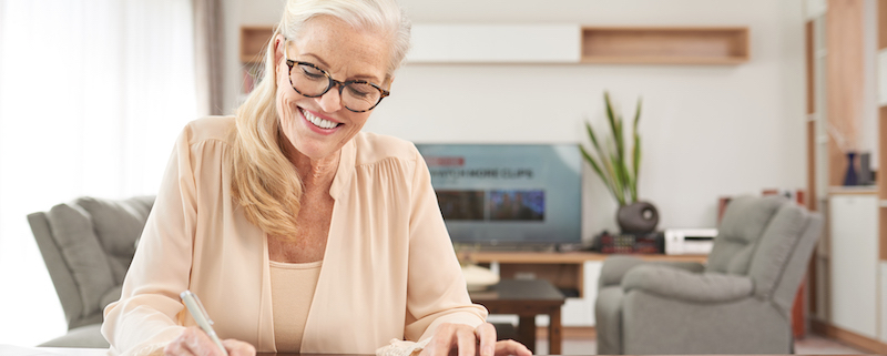 Woman Working on an Expense Report