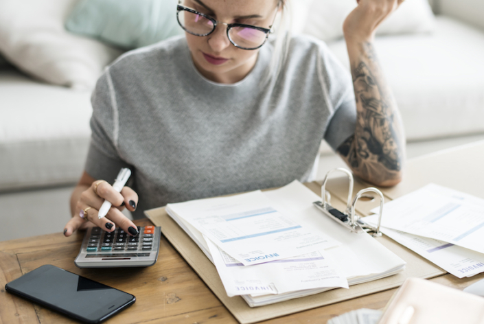 Woman working on invoicing process