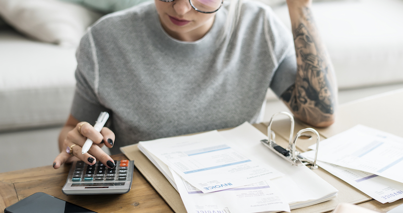Woman working on invoicing process