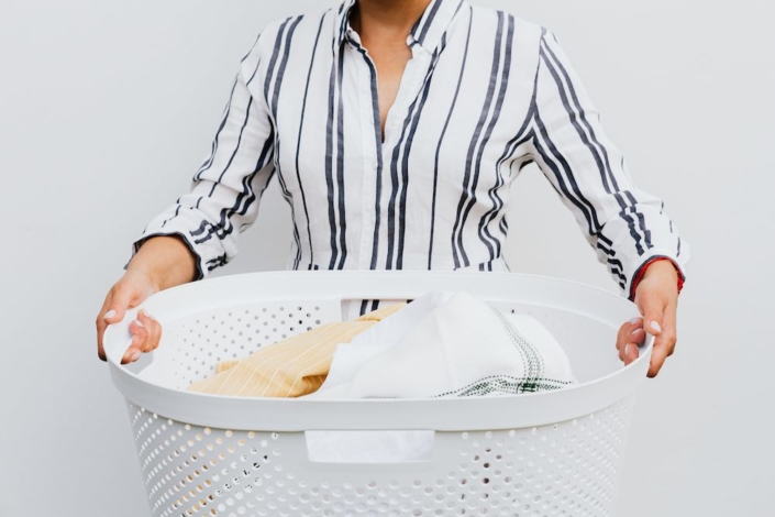 a person with a basket of laundry